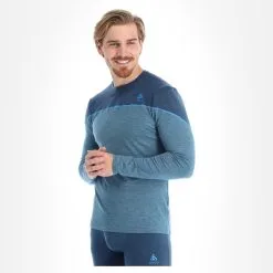 Odlo, Revelstoke Chemise Thermo Hommes Teal Melange, Indigo Bunting Bleu -ColourWear Soldes odlo revelstoke fa thermoshirt heren teal melange indigo bunting 22odlox105v1 BI 04