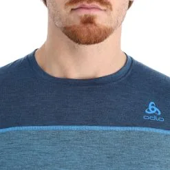 Odlo, Revelstoke Chemise Thermo Hommes Teal Melange, Indigo Bunting Bleu -ColourWear Soldes odlo revelstoke fa thermoshirt heren teal melange indigo bunting 22odlox105v1 BI 05