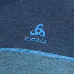 Odlo, Revelstoke Chemise Thermo Hommes Teal Melange, Indigo Bunting Bleu -ColourWear Soldes odlo revelstoke fa thermoshirt heren teal melange indigo bunting 22odlox105v1 BI 06